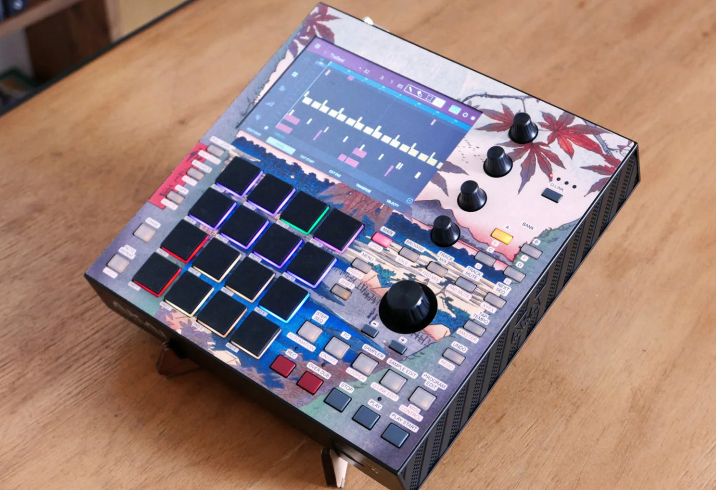 An Akai MPC One with a skin on the device