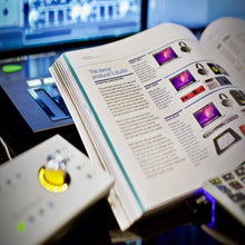 the-secrets-of-dance-music-production-book-layed-out-on-producer's-desk